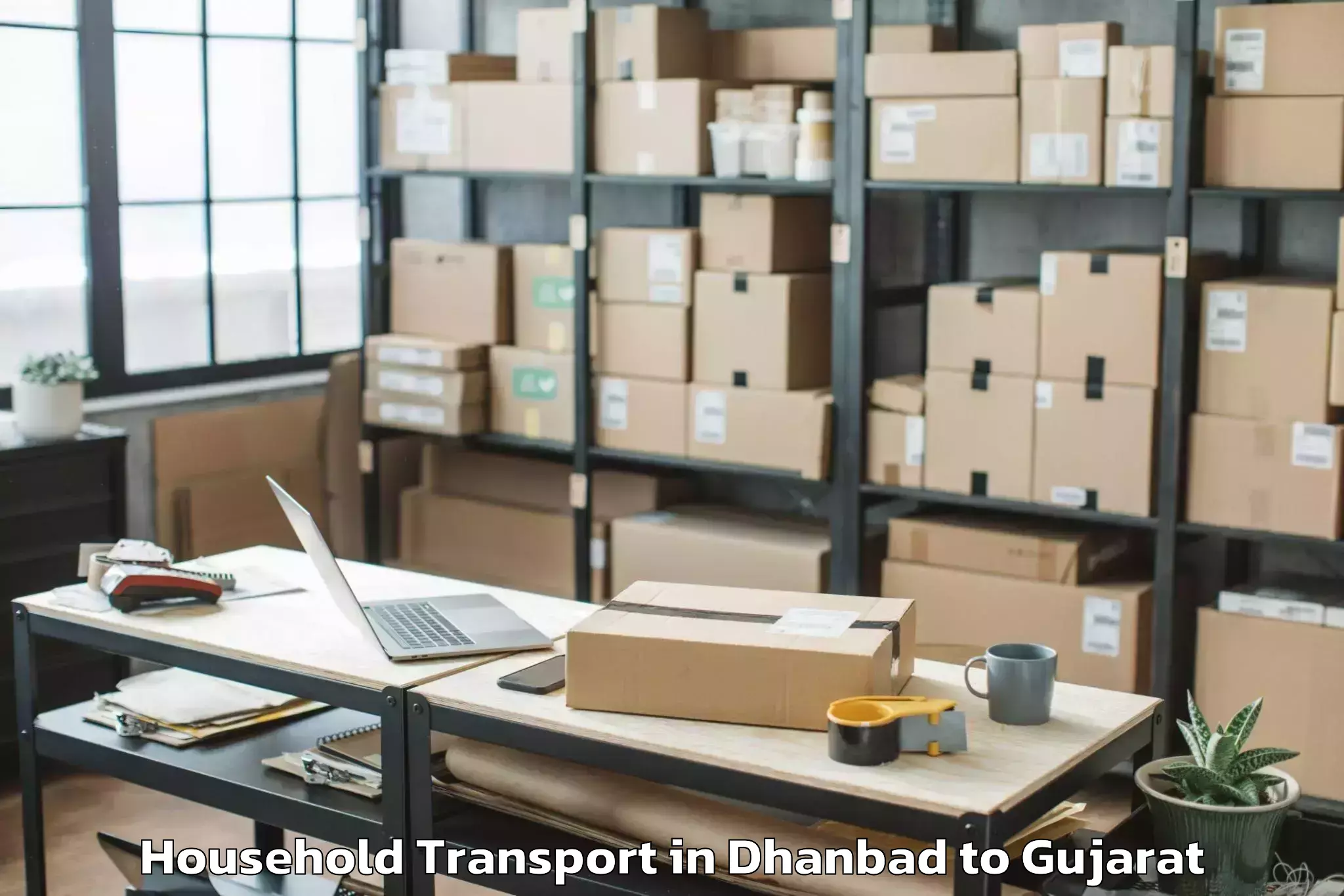 Trusted Dhanbad to Shehera Household Transport